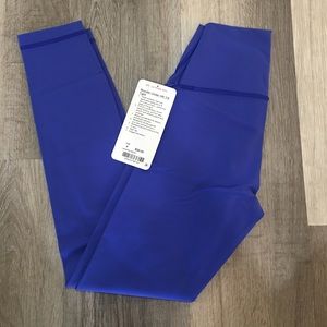 Blue lululemon 7/8 wunder under leggings.